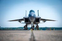 Airmen from the 104th Fighter Wing and 103d Airlift Wing perform rapid rearming and refueling of an F-15 Eagle during a Distributed Integrated Combat Turn exercise at Westover Air Reserve Base, Massachusetts, July 24, 2025. (U.S. Army National Guard photo by Captain Michael Wilcoxson)