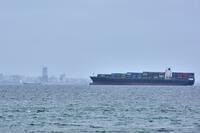 A container ship is seen in the Strait of Hormuz