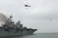 US Navy Weighs Evidence in Warship Fire