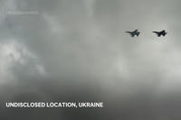 Ukraine's Zelenskyy Displays Newly Arrived F-16 Fighter Jets to Combat Russia in the Air