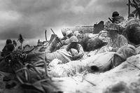 Marines take cover during the Battle of Tarawa, November 1943. (U.S. Navy photo)