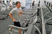 An airman finishes up his workout in the treadmill room at the Rosburg Fitness Center.