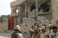 Iraqi Security forces deploy after clashes with militants in Ramadi, 70 miles west of Baghdad, Iraq. (AP Photo/Iraqi Army)