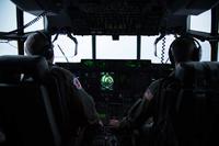 Maj. Kendall Dunn and Lt. Col. Ivan Deroche fly a WC-130J Super Hercules aircraft into Hurricane Harvey during a mission out of Keesler Air Force Base, Mississippi Aug. 24, 2017. (U.S. Air Force/Staff Sgt. Heather Heiney)