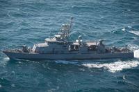 The patrol craft USS Squall (PC 7) steams in the Arabian Gulf acting as a small boat threat toward guided-missile destroyer USS Mitscher during a simulated strait transit. (U.S. Navy photo: Anthony R. Martinez)