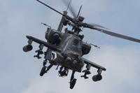 A U.S. Army AH-64 Apache helicopter assigned to the 82nd Airborne Division conducts an aerial demonstration during the Airborne Review as part of All American Week 100 at Fort Bragg, N.C., May 25, 2017. (U.S. Air Force photo/Tech. Sgt. Barry Loo)