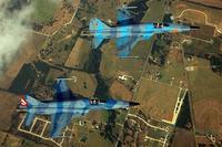 F-5N Tiger IIs fly in formation. (Navy Photo)