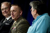 Marine Capt. Matthew Phelps participates in a discussion panel during the Defense Department's Lesbian, Gay, Bisexual and Transgender Pride Month event at the Pentagon on June 26. Photo by Petty Officer 1st Class Chad J. McNeeley