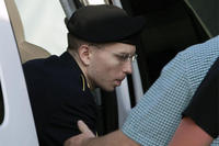 Army Pfc. Bradley Manning arrives at the courthouse in Fort Meade, Md., Monday, July 8, 2013,