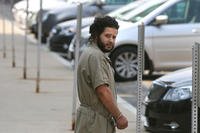 Mufid Elfgeeh is taken from his arraignment in federal court in Rochester, NY, Monday June 2, 2014. (AP Photo/Democrat &amp; Chronicle, Shawn Dowd)