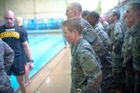 Female Ranger Training Assessment Course students demonstrate their knowledge of combat water survival techniques during the Ranger Training Assessment Course. (Army photo)