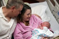 A family rests at Evans Army Community Hospital on Fort Carson, Colorado. (Devin Fisher/U.S. Army)
