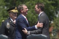 Secretary of Defense Ash Carter congratulates Secretary of the Army Eric Fanning at his arrival ceremony, June 20, 2016. (DoD photo by Navy Petty Officer 1st Class Tim D. Godbee)