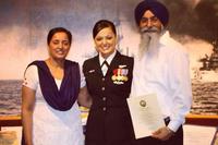 Geena Kaur Sidhu, a petty officer in the U.S. Navy, with her father, Satwinder Singh Bhola and her mother, Sarvinder Kaur (Geena Kaur Sidhu photo via Facebook)