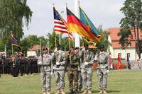 Soldiers from the 7th Army Noncommissioned Officer Academy comprise the color guard with German soldier Oberfähnrich Andre Potzler carrying the Federal Republic of Germany flag. (U.S. Army photo)