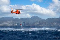 A Coast Guard rescue team from Coast Guard Station Barbers Point extracts U.S. Army pilots of 2-6 Cavalry Regiment, 25th Combat Aviation from the ocean off the coast of Honolulu Feb 17. (U.S. Army photo by Sgt. Daniel K. Johnson)
