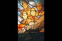 A stained glass window of the four chaplains located in the A-ring of the Pentagon on the third floor. (DoD)