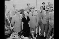 Gen. Marshall, right, welcomes Gen. Dwight Eisenhower, left, and Mamie Eisenhower to Washington shortly after the Allied victory in 1945. (National Archives photo)