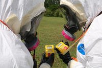 Students at the Center for Domestic Preparedness in Alabama survey a simulated accident scene that poses a radiological threat.