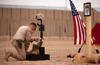 Marine during a memorial service in Afghanistan