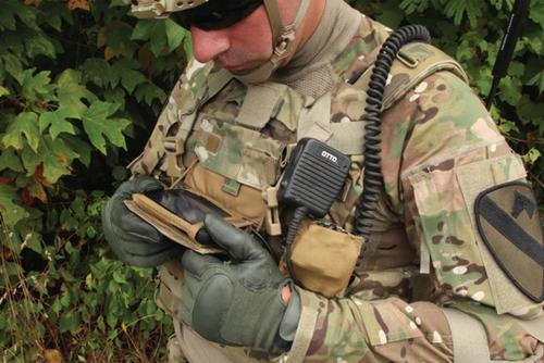 Soldier checks out his smartphone. (Photo Credit: PEO Soldier)