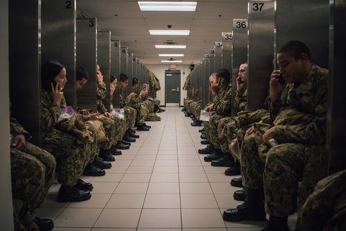 Recruits call home during their scheduled divisional phone calls at Recruit Training Command in Great Lakes, Illinois.