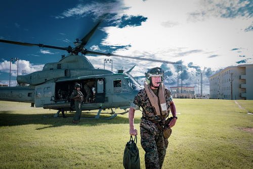 Gen. Eric M. Smith departs an UH-Y at Marine Corps Base Camp Schwab on Okinawa