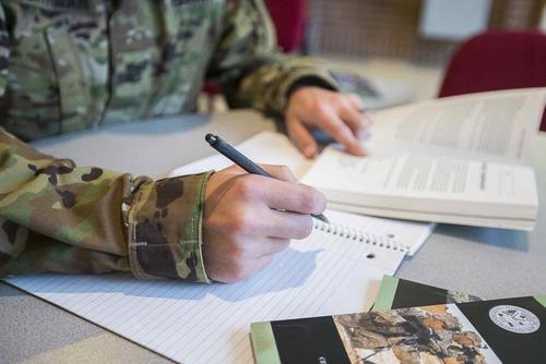Service member researches financial aid options