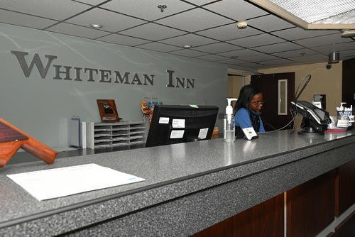 A Whiteman Inn accounting technician takes a phone call from a customer