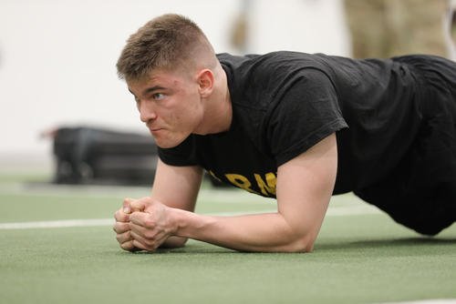 An Indiana Guardsman completes the plank portion of the Army combat fitness test at Camp Atterbury, Indiana, during the Best Warrior Competition.