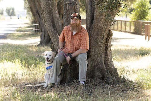 Daryl Sager with his Canine Companions service dog, Adria, a Labrador cross golden retriever. (Canine Companions)