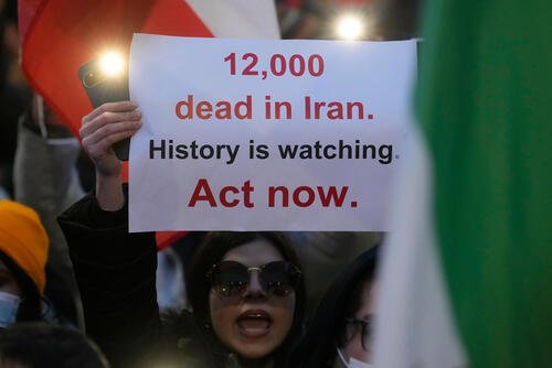 Protesters participate in a demonstration supporting protesters in Iran, in front of the US Consulate, Milan, Italy, Tuesday, Jan. 13, 2026. (AP Photo/Luca Bruno)
