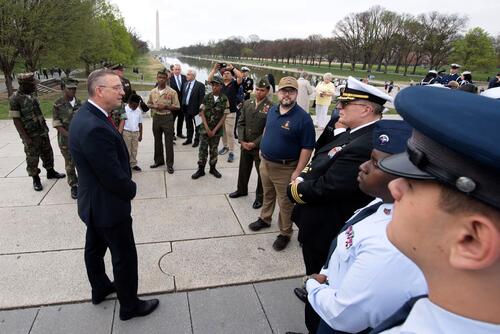 VA secretary speaks to assembled veterans on the National Mall.