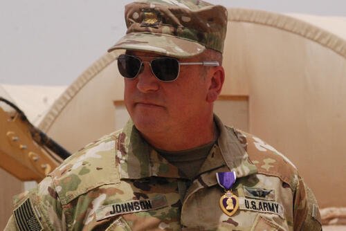 Maj. Alan Johnson was presented the Purple Heart on May 2, 2020, for his injuries sustained during the theater ballistic missile attacks at Al Asad Air Base, Iraq, on January 8, 2020. (U.S. Army photo by Sgt. Morgan Maidl)