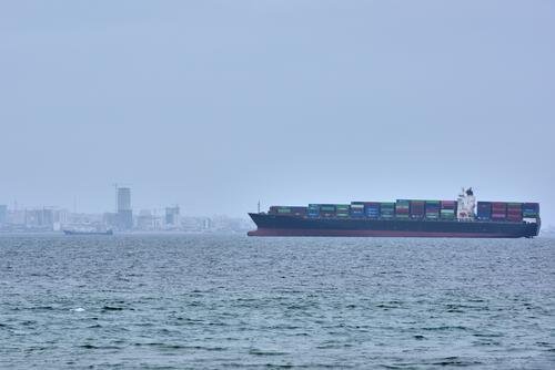 A container ship is seen in the Strait of Hormuz